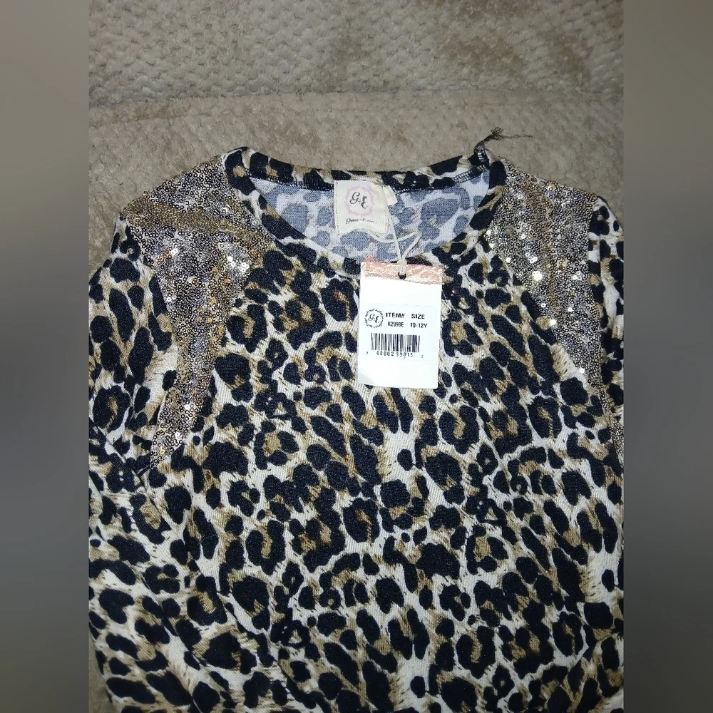 Leopard Print Sequin Shoulder Top.Grace and Emma leopard print 10/12
